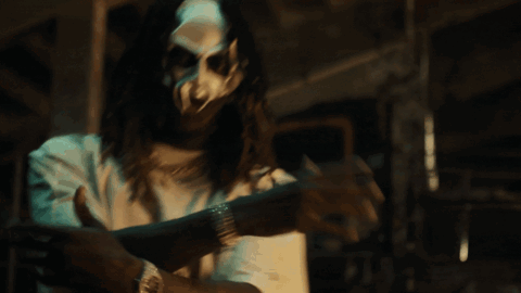 Long Haired Man with Mask and Watch