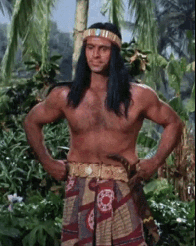 Long Haired Shirtless Man Headband Hands On Hips