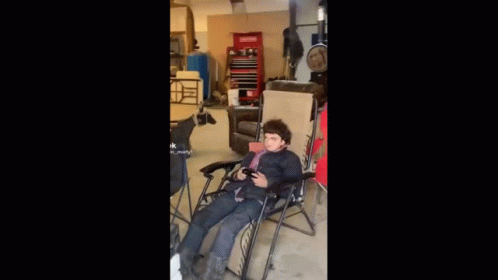 Look At Me Guy Seating While Playing GIF