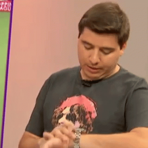 Looking At Watch Sad Frown GIF