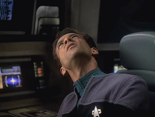 Star Trk Bashir Looking Up GIF