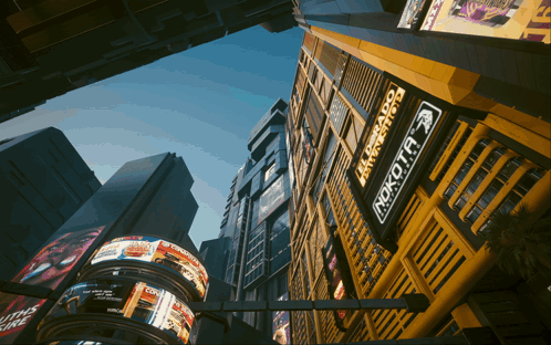 Looking Up at Building With Rokota Sign
