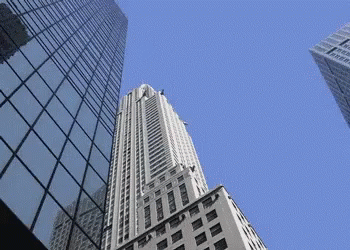 Looking Up at Tall Building with C