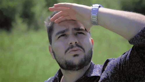 Looks Up Shielding Eyes Ignace Aleya GIF