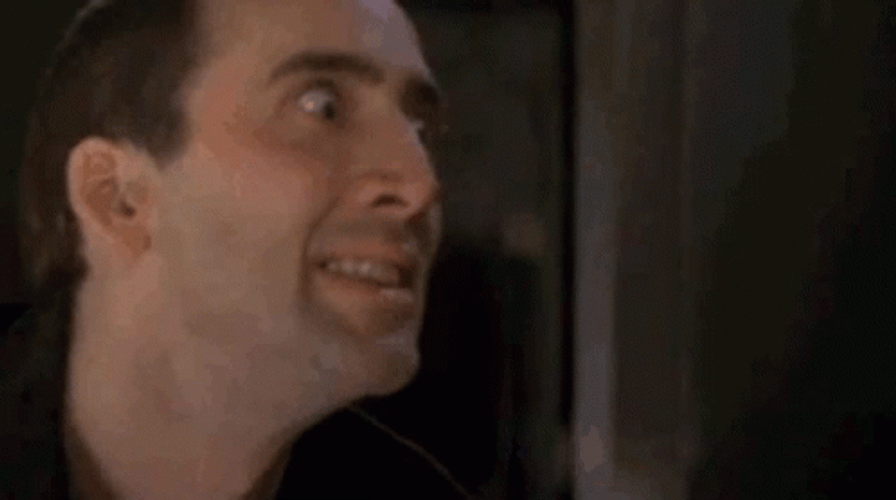 Looney Nic Cage Insane Eyes GIF