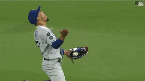 Los Angeles Dodgers Baseball Player Holding Ball