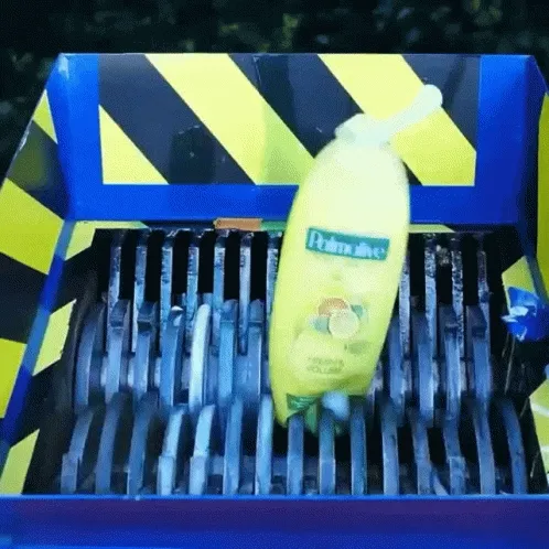 lotion-bottle-inside-crusher-machine-ni2yrbgj1zkv0x5x.webp
