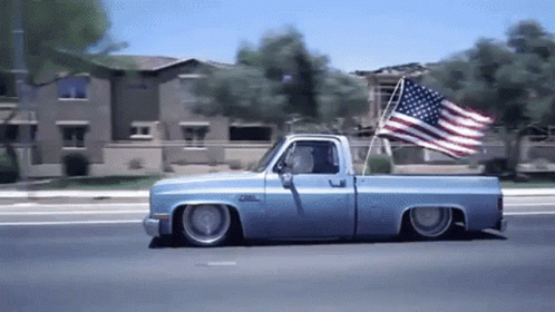 Lowrider Car With American Flag GIF