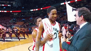 Lowry Back Hug Released By Derozan During Interview GIF