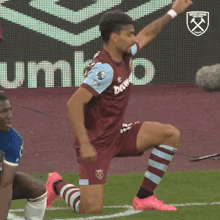 Lucas Paqueta Fist Pump While Kneeling GIF