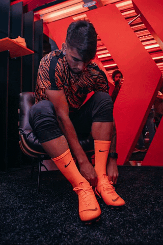 Lucas Paqueta Putting On Football Shoe GIF
