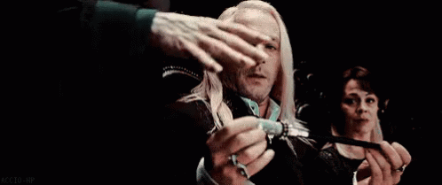 Lucius Malfoy Giving Magic Wand GIF