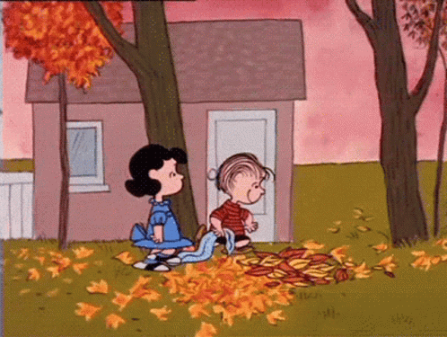 Lucy and Linus Playing With Leaves