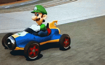 Luigi Driving Toy Car On Race Track GIF