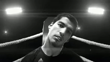 Luis Suarez Dodging Punches GIF