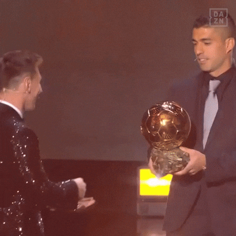 Luis Suarez Give Trophy With Hug To Lionel Messi GIF