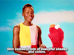 Lupita Nyong'o With Elmo Dancing Shares Life Lesson GIF