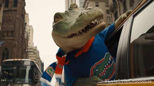 Lyle Crocodile Looking Outside The Car Window GIF