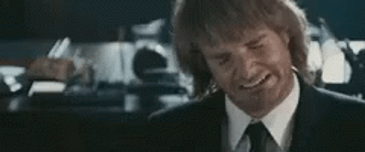 Macgruber Laughing While Closing Eyes GIF