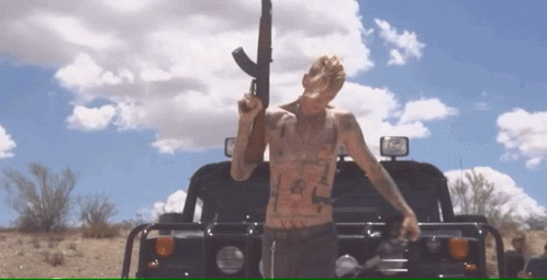 Machine Gun Topless Guy GIF