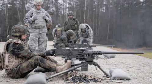 Soldiers Firing The 50 Caliber Machine Gun GIF