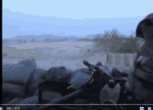 Soldiers Firing Machine Gun GIF