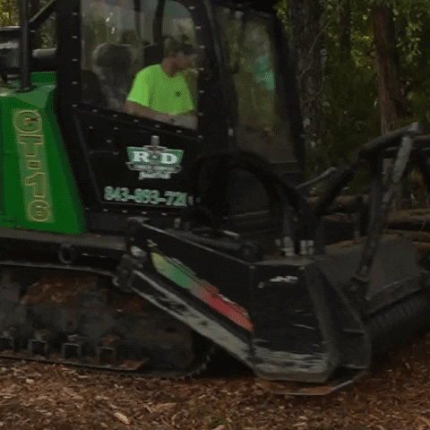 Machine Running Backward While Making Mulch GIF