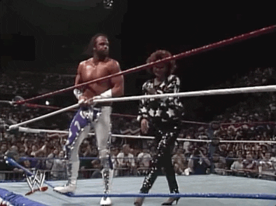 Macho Man Checking Out A Woman GIF