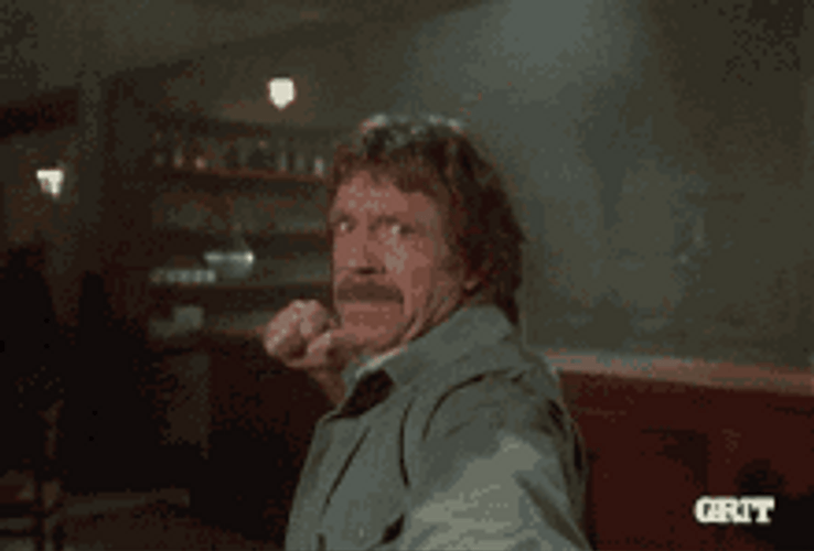 Mad Chuck Norris Punching GIF