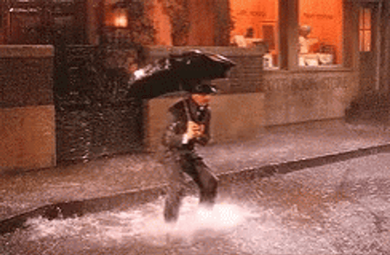 Mad Man Splashing Rain Water GIF
