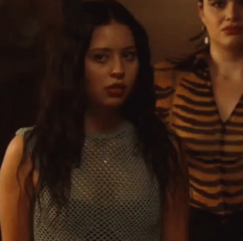 Maddy Perez Confused Looking Back GIF