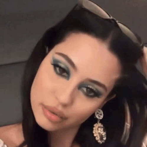 Maddy Perez Cheeky Serene Demeanor GIF