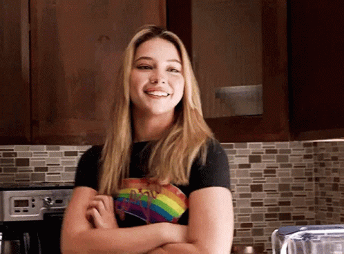 Madelyn Cline Crossed Arms Happy Smile GIF