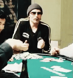 Mads Mikkelsen Happily Playing Poker GIF