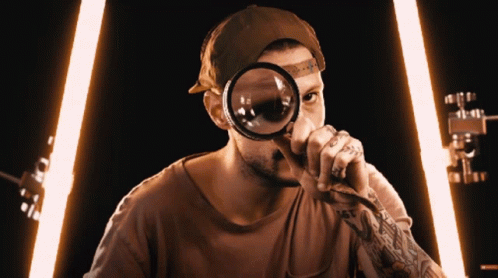 Magnifying Glass Tattooed Curious Guy Inspecting GIF