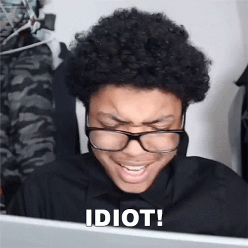 Male Reading Idiot  GIF