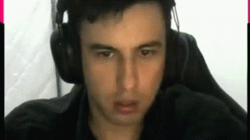 Male Streamer Closing Eyes After Flashbang GIF