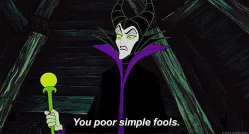 Maleficent Holding Green Wand Saying You Poor Simple Fools