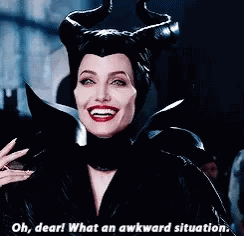 Maleficent Malevolent Chuckle Awkward Situation GIF