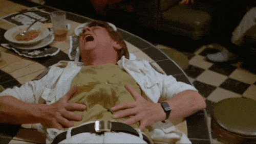 Man Aching Tummy Confused Actor John Travolta GIF