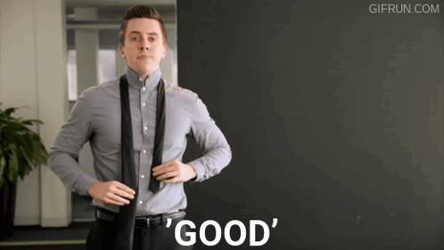 Man Adjusting Tie Saying Good
