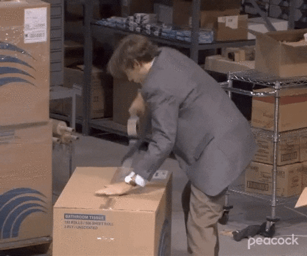 Man Aggressively Tape The Box GIF