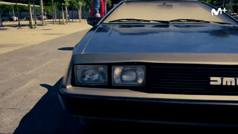 Man Alighting From Delorean GIF