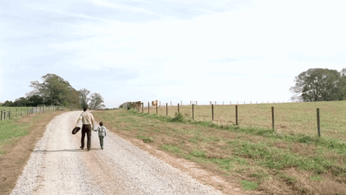 Man And Boy Holding Hands GIF