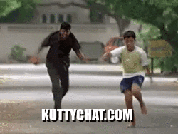 Man and Boy Running Down Street
