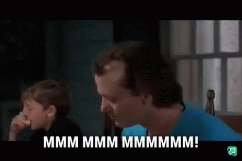 Man And Boy Sitting At Table Talking GIF