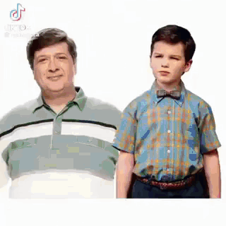 Man and Boy Standing Together
