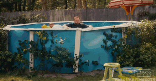 Man and Child in Pool