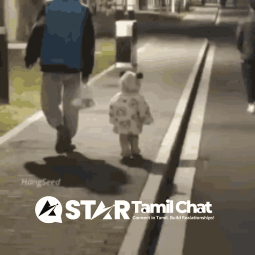 Man and Child Walking Down Sidewalk