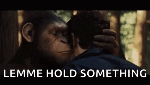 Man And Chimpanzee Looking At Each Other Saying Lemme Hold Something GIF